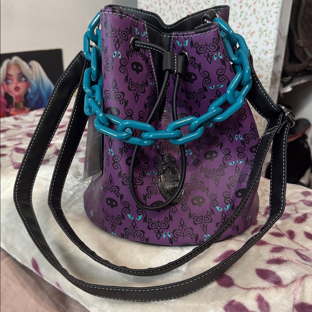 Rare. Purple Drawstring Bucket Bag with Teal Chain Accent